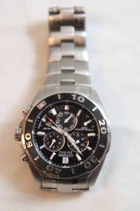 lot 63 image: Citizen Eco Drive Perpetual Chromo Watch. Model The Signature Collection COURAGEOUS E820-5074878 Sapphire Crystal. Matte silver flex band.