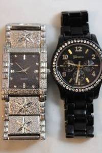 lot 72 image: (2) Quartz watches - Geneva Platinum Model 9073 (Black and gold) and Silver tone watch with star motif.