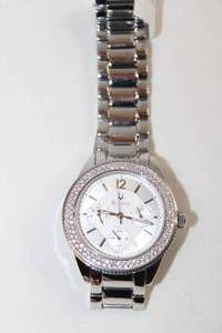 lot 79 image: Bulova watch w crystal accents. Model C6691071 3 dial face with recessed center section.