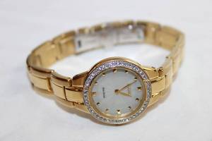 lot 81 image: Citizen Eco Drive watch w crystal accents. Mode B023-5092990 Gold polished and matte link band.