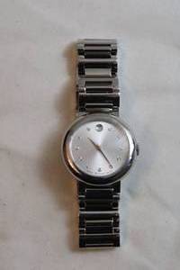 lot 87 image: Movado watch w polished silver metal band. Swiss made. Model 23.3.14.1221