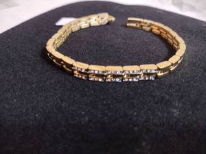 lot 100 image: Citizen gold plated and crystal bracelet. Marked Citizen. Fold over clasp. 7.5L