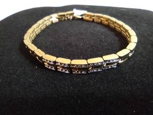 lot 101 image: Citizen gold plated and crystal bracelet. Marked Citizen. Fold over clasp. 7.5L