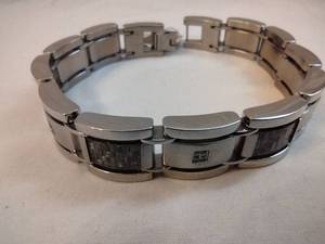lot 110 image: Stainless Steel diamond and textured station link bracelet. Diamonds tested. Fold over clasp. 8.5L