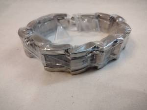 lot 111 image: Stainless Steel diamond and textured station link bracelet. Diamonds tested. Fold over clasp. 8.5L