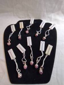 lot 127 image: (10) Persona brand Sterling Silver and glass  crystal charms. Most marked 925 andor have retail tags that say 925. Retail $30 each