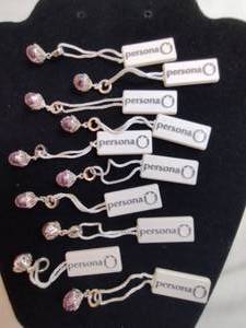lot 132 image: (10) Persona brand Sterling Silver and glass  crystal charms. Most marked 925 andor have retail tags that say 925. Retail $30 each