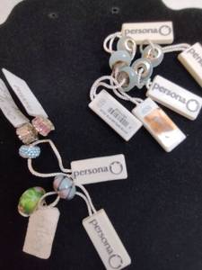lot 138 image: (10) Persona brand Sterling Silver and glass  crystal charms. Most marked 925 andor have retail tags that say 925. Retail $30 each