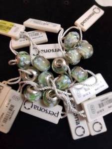 lot 143 image: (11) Persona brand Sterling Silver and glass  crystal charms. Most marked 925 andor have retail tags that say 925. Retail $30 each