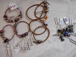 lot 146 image: (6) brown lariat style bracelets w 16 Persona Sterling Silver glass and crystal beads.