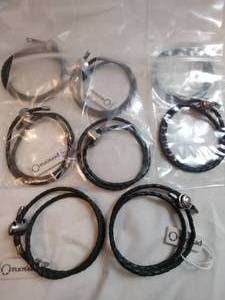 lot 147 image: (8) black lariat style bracelets designed for the Persona Beads