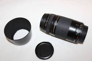 lot 15 image: Canon Lens with UV Protector Filter and Hood