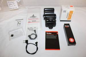 lot 20 image: Camera Accessories Vivitar 285 HV Flash, Includes Pocket Wizards, Vivitar Shutter Cord, and Turbo Cable