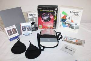 lot 24 image: Camera Accessories ExpoDisc White Balance Filters, Light Reflectors, QP Card 101, Software EZ color suite and SpyderPro, Spyder Cube