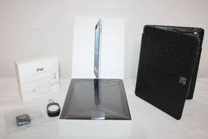 lot 29 image: iPad Wi-Fi 4G 64GB Black SIB, iPad Power Adapter, and  Case (Factory Reset)