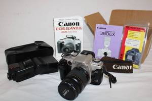 lot 152 image: Canon EOS ELAN IIE Camera, Flash, and FlipUp LCD Cap SIP