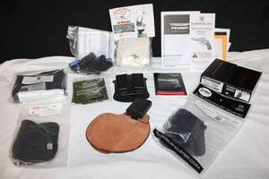 lot 186 image: Pocket and Shoulder Holsters SIP, Walther Paddle Holster SIP, Leather Pager Pal, Air Marshal Holster SIP and More, see pictures