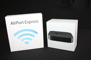 lot 205 image: Apple Airport Express Model A1264, and Apple TV Model MD199LLA