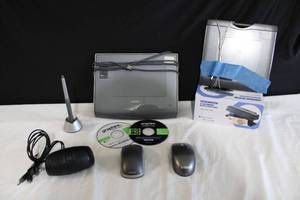 lot 216 image: Electronics iHome Speaker, Wacom System Model PTZ-431W, and Wacom Model CTE-430 PLUS Counterfeit Money Detector