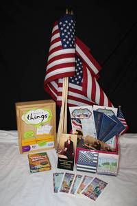 lot 319 image: Yard Flags, Constitution Pamphlets, 2023 calendars, the game of things� and Card game