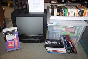 lot 304 image: Toshiba 13 TV with VCR Player Plus Large collection of VHS Tapes (mostly Disney), see pictures