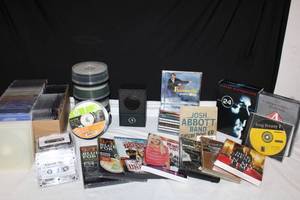 lot 248 image: Soundmaster Portable Speaker, Extra Blank CDs and Jewel Cases, Book ,CDs and DVDs as shown