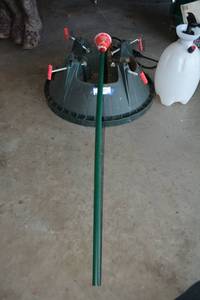 lot 340 image: Plastic 4-screw Christmas Tree Holder, Tree Watering Funnel and Plastic Sprayer