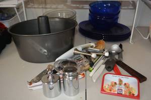 lot 270 image: Kitchen Lot Blue Dishes, Clear Bowls, Utensils, Angel Food Cake Pan