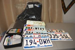 lot 325 image: Automotive License Plates, Floor Mats Never Used, and First aid Kit with Lexus Case