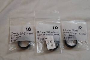 lot 46 image: (3) Titanium band rings. Marked. All size 10