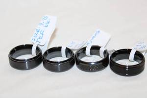 lot 47 image: (4) Titanium band rings. Marked. 3-size 9.5, 1-size 8.5
