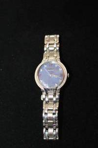 lot 403 image: Citizen Eco Drive watch with diamond surround and polished and matte silver flex band. 20 diamonds on surround. 8 diamond markers. Diamonds tested. Model E031-S083168
