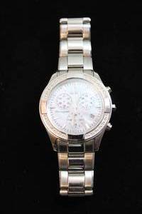 lot 404 image: Citizen Eco Drive chronograph watch with diamond surround and polished and matte silver flex band. 28 diamonds on surround. Diamonds tested. Model H504-5079128