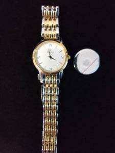 lot 398 image: Bulova diamond non-working watch. Diamonds at the markers. Model C935132 Pearlized face.