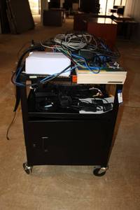 lot 12 image: Electronics and Cart Polycom ViewStation, Computer Speakers, Mouse, Bretford Cart
