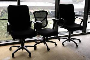 lot 29 image: 3 Black Office Chairs - 1 has Mesh Back