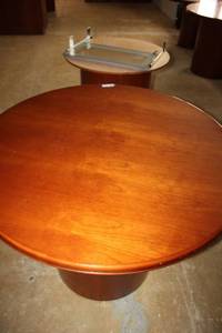 lot 39 image: Two 42 Round Pedestal Dining Tables