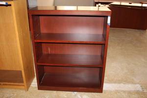 lot 56 image: Cherry Colored 3- Shelf Bookcase