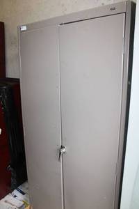 lot 69 image: Grey Metal 2-Door Storage Cabinet and Contents Spackling, Joint Compound, Roof Sealant, Floor Paint and Tools as shown