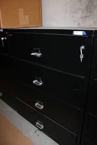 lot 73 image: Black Fire king 4-Drawer File Cabinet with Key - Fire and Impact Resistant