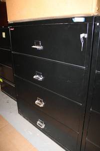 lot 74 image: Black Fire king 4-Drawer File Cabinet with Key - Fire and Impact Resistant