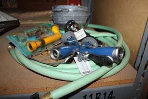 lot 132 image: Garden Hose and Hose Nozzles Plus Planter Trays
