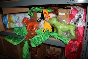 lot 148 image: Kiddie Pool, Inflatable Palm Trees, Toy Dogs, Nerf Gun