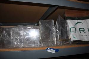 lot 277 image: Clear Plastic Table Display Stands, and Bag