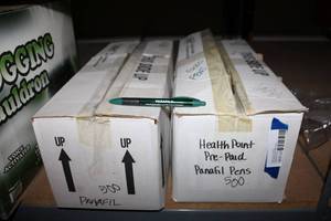 lot 288 image: 2 Boxes and Promotional Pens