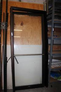 lot 481 image: Building Supplies Glass Door with Aluminum Frame 73x33
