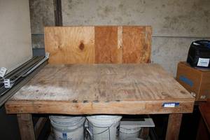lot 505 image: Solid Wood Work Bench 4x28x31 Plus Extra Boards Behind Table