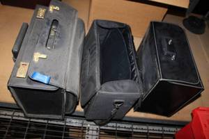 lot 553 image: 2 Briefcases and 1 Slide Projector Case as shown