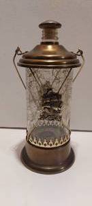 lot 1 image: MCM Brass and glass musical whiskey decanter