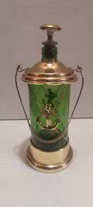 lot 11 image: MCM Brass and glass musical whiskey decanter